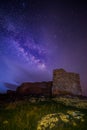 The milky way galaxy seen near an ancient citadel in Romania during a clear night