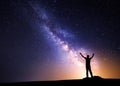 Milky Way. Night sky and silhouette of a man