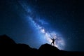 Milky Way. Night sky and silhouette of a standing man Royalty Free Stock Photo