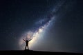 Milky Way. Night sky and silhouette of a standing man Royalty Free Stock Photo