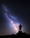 Milky Way. Night sky with stars and silhouette of a man Royalty Free Stock Photo