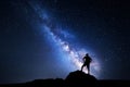 Milky Way. Night sky with stars and silhouette of a man Royalty Free Stock Photo