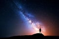 Milky Way. Night sky with stars and silhouette of a man Royalty Free Stock Photo