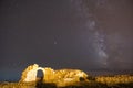 Milky way over the ancien ruin door entrance for a space dimension