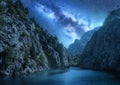 Milky Way over the beautiful mountain canyon and sea at night Royalty Free Stock Photo