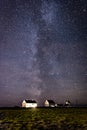 Milky way over farm in Norway Royalty Free Stock Photo