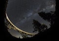 Milky way over light painted bridge Royalty Free Stock Photo