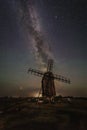 Milky Way over a windmill att Gettlinge burrial ground Royalty Free Stock Photo