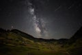 Milky way and Perseid meteor shower in the Transylvania mountains , Romania Royalty Free Stock Photo