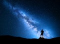 Milky Way and silhouette of a man. Night landscape Royalty Free Stock Photo