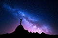 Milky Way with silhouette of a standing happy girl Royalty Free Stock Photo