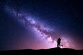 Milky Way. Silhouettes of hugging and kissing man and woman Royalty Free Stock Photo