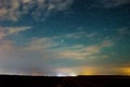 Milky Way and starry sky with clouds