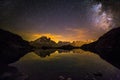 Milky Way and Starry Sky over Iconic Snowy Mont-Blanc Peaks Reflecting in Altitude Lake Royalty Free Stock Photo