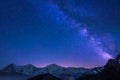 Milky Way and stars in night sky over the Swiss Alps with Eiger, Monch and Jungfrau Royalty Free Stock Photo