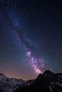 Milky Way and stars in night sky over the Swiss Alps at Lauterbrunnen Royalty Free Stock Photo