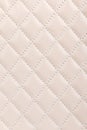 Milky white quilted leather background