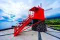 mill on Avenida do Mar, red with strong colors in the parish of SÃÂ£o Roque, Pico Island, Azores archipelago.