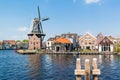 Mill and cafe along Spaarne river, Haarlem, Netherlands