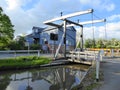 Mill and canal lift bridge Royalty Free Stock Photo