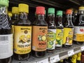 Mill Creek, WA USA - circa April 2022: Angled selective focus on bottles of ponzu sauce in the Asian food section of a Town and Royalty Free Stock Photo