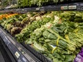 Mill Creek, WA USA - circa April 2022: Angled, selective focus on leafy greens for sale in the produce department of a Town and