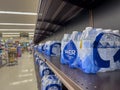 Mill Creek, WA USA - circa July 2022: View of low inventory of bottled water for sale inside a QFC grocery store