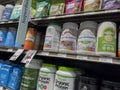 Mill Creek, WA USA - circa May 2022: Angled, selective focus on a variety of protein powders and supplements inside a Town and