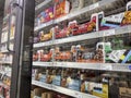 Mill Creek, WA USA - circa May 2022: Angled view of a variety of frozen burritos for sale in the freezer section of a Town and