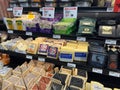 Mill Creek, WA USA - circa May 2022: Top down, angled view of a variety of cheeses for sale inside a Town and Country Market