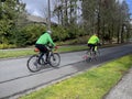 Mill Creek, WA USA - circa May 2023: Wide view of a group of bicycle riders enjoying a recreational day in late spring