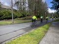 Mill Creek, WA USA - circa May 2023: Wide view of a group of bicycle riders enjoying a recreational day in late spring