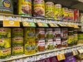 Mill Creek, WA USA - circa October 2022: Angled, selective focus on enchilada sauces for sale inside a Sprouts Market