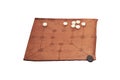 Mill game, popular in ancient Roman, isolated on a white background. Reconstruction of board games from the Roman Empire