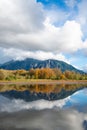 Mill Pond in Snoqualmie with reflection of Mount Si under towering clouds