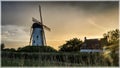 Mill at the sunset. Village Damme, near Bruges, Belgium.