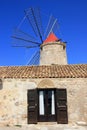 Mill window on blue summer sky, Sicily