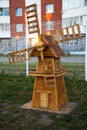 The mill is wooden, the layout of the particle Board is brown, a ray of sun in the blades. Playgrounds,