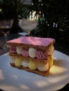 Mille-feuille raspberry chantilly dessert on a white plate Royalty Free Stock Photo