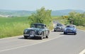Aston Martin DB2 Vantage and Siata Daina Gran Sport during Mille Miglia 2009 historic car race in Tuscany, Italy Royalty Free Stock Photo