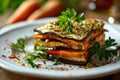 Millefeuille with Eggplants and Carrots on White Restaurant Plate, Fried Sliced Eggplant and Carrot