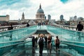 The Millenium Bridge and Saint Paul Cathedral on a typical rainy day in London Royalty Free Stock Photo