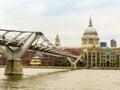 Millenium Bridge and St Paul`s Cathedral. London Royalty Free Stock Photo