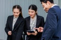 Millennial Asian Indian professional male businessmen female businesswomen employee staff colleagues in formal business suit Royalty Free Stock Photo