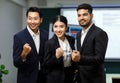 Millennial Asian professional male businessmen female businesswomen employee staff colleagues in formal business suit sitting Royalty Free Stock Photo