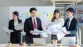 Millennial Asian young upset stressed male female businessmen businesswomen employee in formal suit working overload overtime with Royalty Free Stock Photo