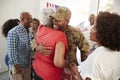 Millennial African American  soldier returning home to family embracing his grandmother,close up Royalty Free Stock Photo