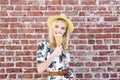 Millennial Caucasian Girl Licks an Ice Cream on a Hot Summer Day While Smiling Royalty Free Stock Photo