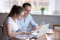 Millennial couple studying contract for new house before signing Royalty Free Stock Photo