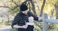 Millennial Dad with Baby in Carrier Outside Walking Royalty Free Stock Photo